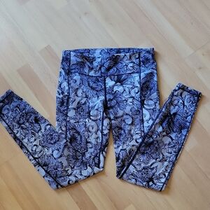 lululemon athletica Black and Purple  Floral Leggings. Size 6